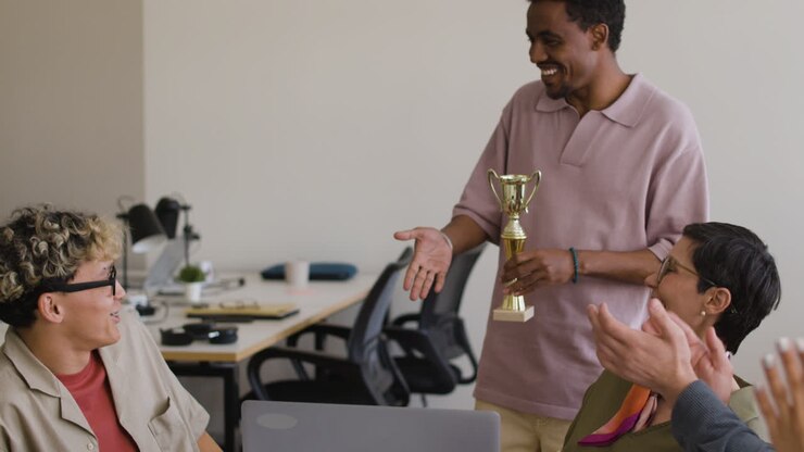 Office Award Ceremony: Colleagues Celebrate Success