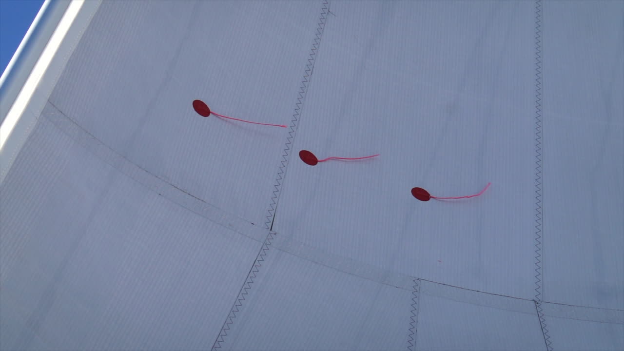 Close up of the wind indicators on the sail of a sailboat