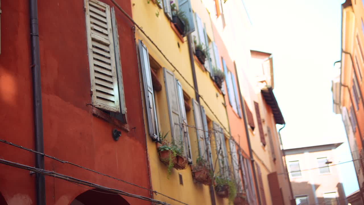 Colorful Italian Buildings with Shutters and Plants