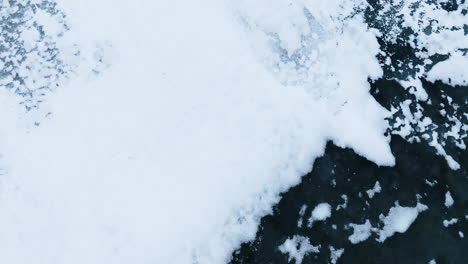 Drone-shot-flying-over-frozen-lake-Michigan