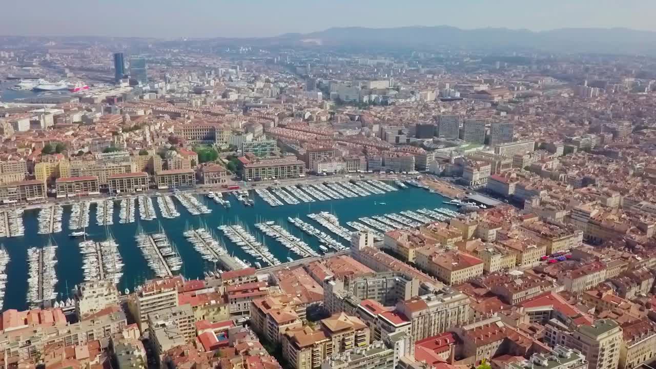 The beautiful and lively Old Port of Marseille, a yacht Marina in Southern France. Wide angle aerial