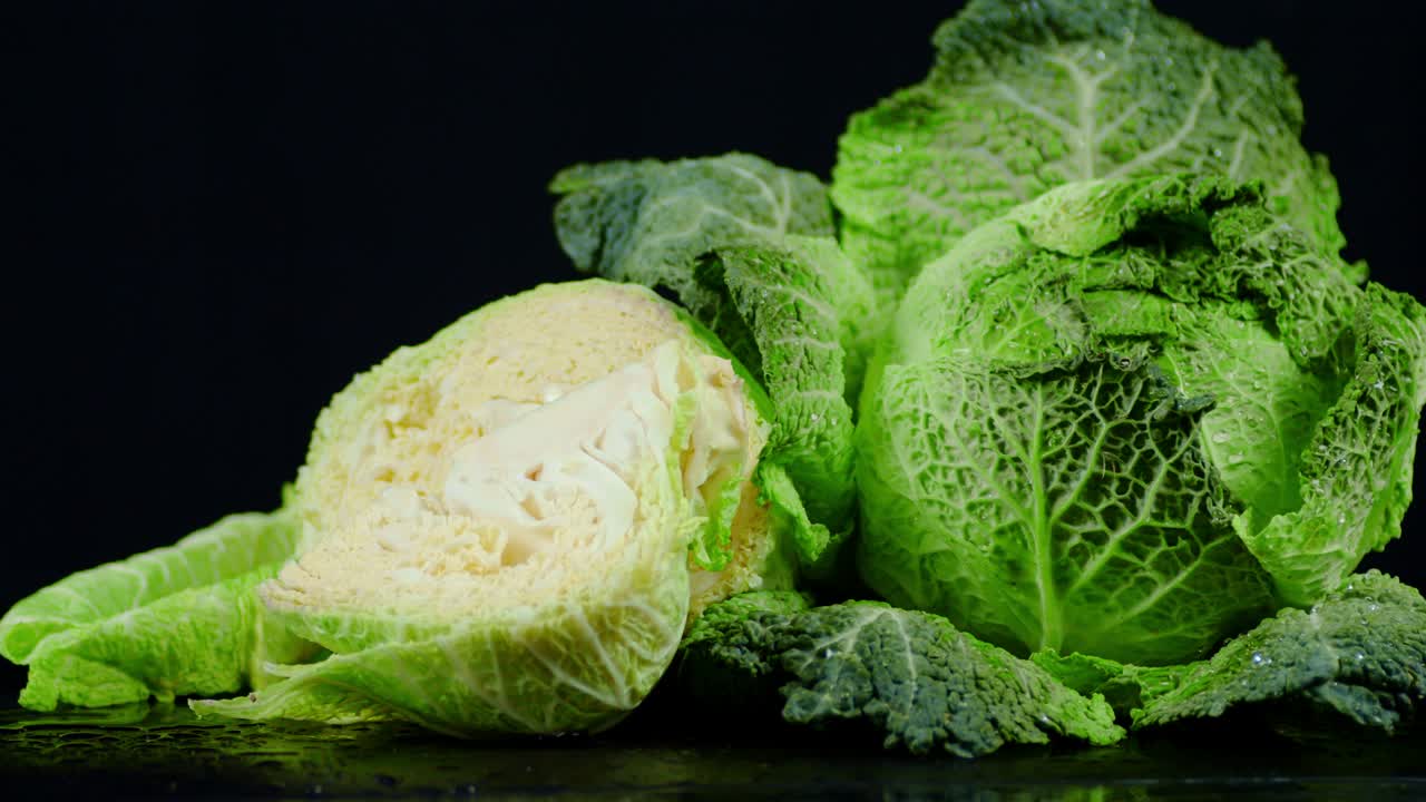Fresh green Cabbage slowly rotates.