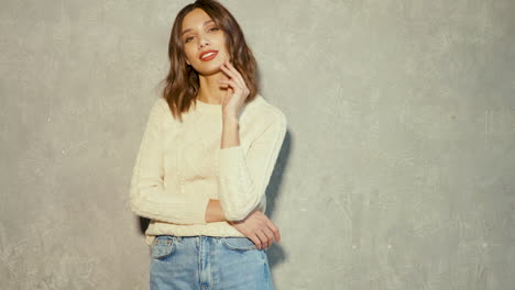 woman in a sweater and jeans