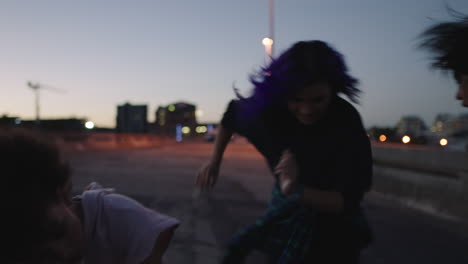 dancing-woman-happy-multi-ethnic-street-dancer-girls-enjoying-funky-hip-hop-moves-performing-freestyle-dance-together-in-city-at-sunset