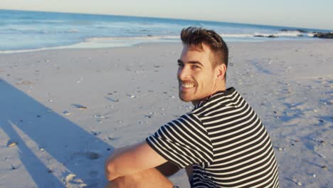 young man relaxing by the sea 4k