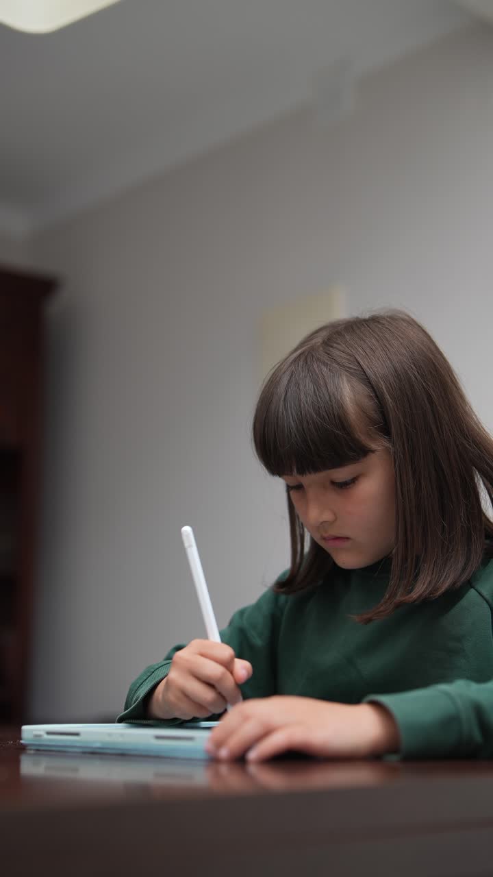 Girl Using Digital Tablet and Stylus