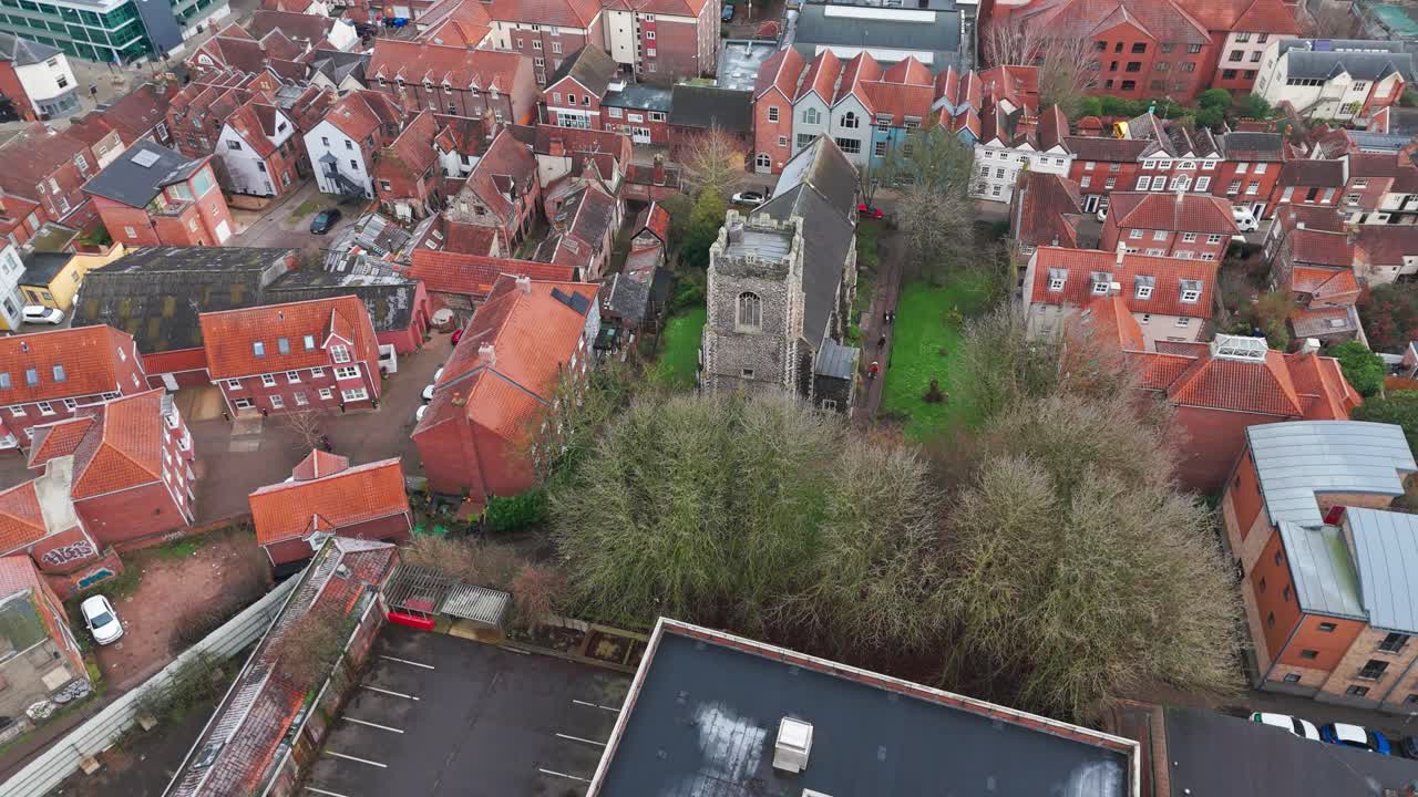 Norwich's streets, churches, and shops, featuring historic buildings, aerial view