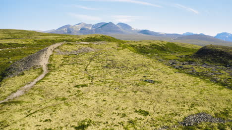 vast lush terrain with slopes at rondane national park in norway