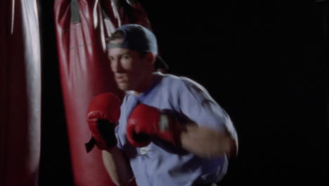 a man practices his boxing skills