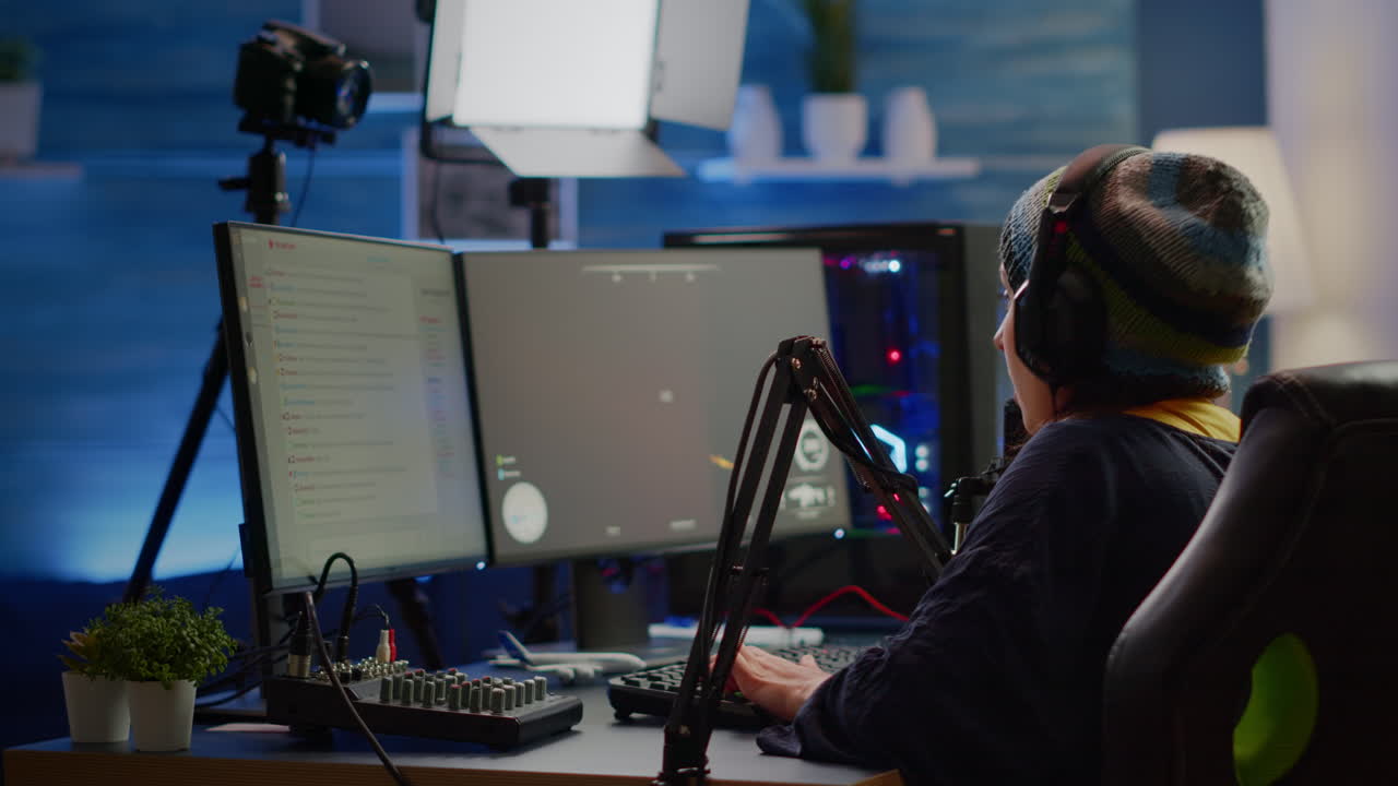 Focused streamer playing shooter game for virtual competition