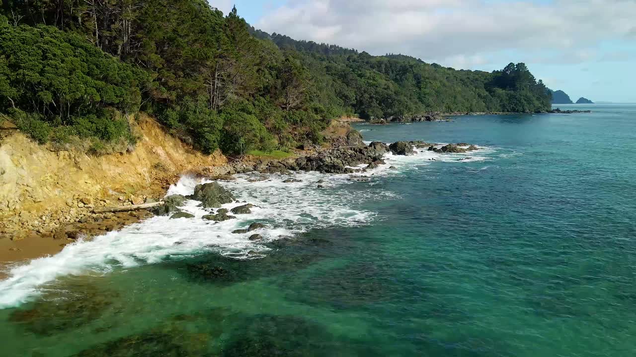 Drone flying over secluded beach on New Zealand's east coast