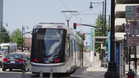 beautiful kansas city street car stop in the summer.