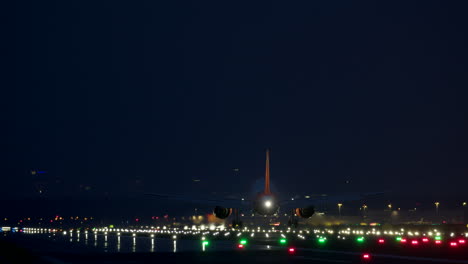 airplane landing at night