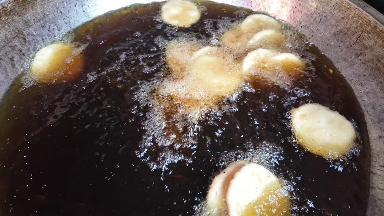 Fried Potatoes in Hot Oil