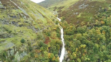 idyllic snowdonia mountain range aber falls waterfalls national park aerial pull away fast view