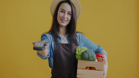 woman farmer selling vegetables at a market
