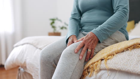 Knee-pain,-hands-and-senior-woman-in-home