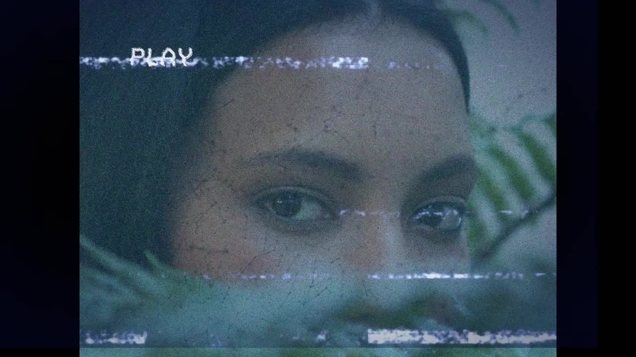 Vhs glitch camera effect over close up of eyes of african american woman