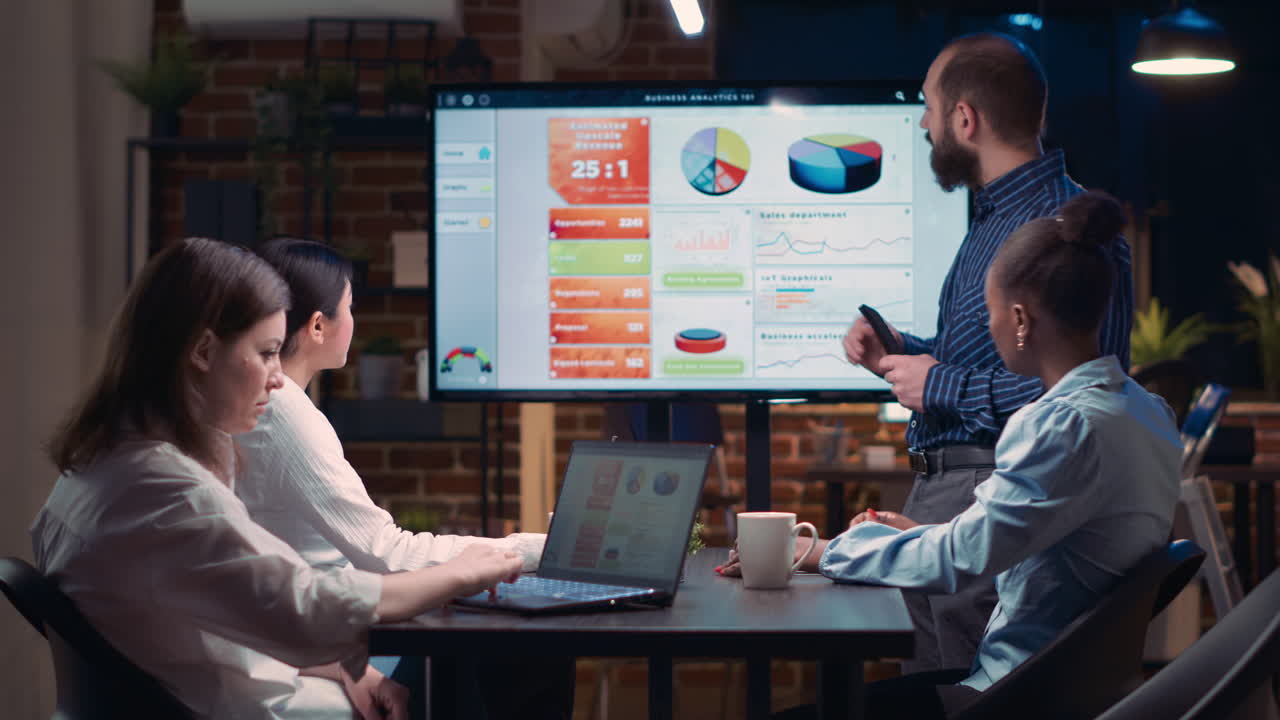 Company executive presenting analytics research in business meeting
