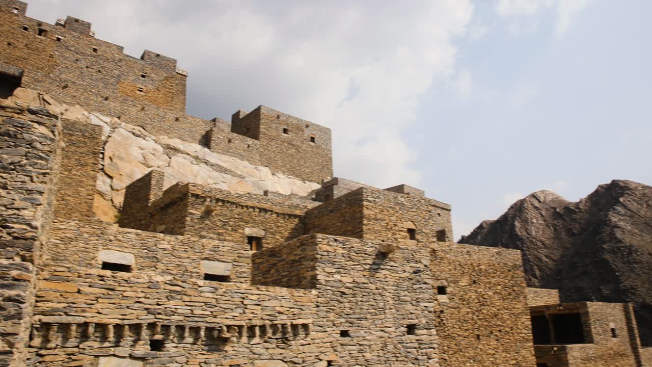 Exterior facade of antique buildings in Zee Ain village at Saudi Arabia, close up pan view
