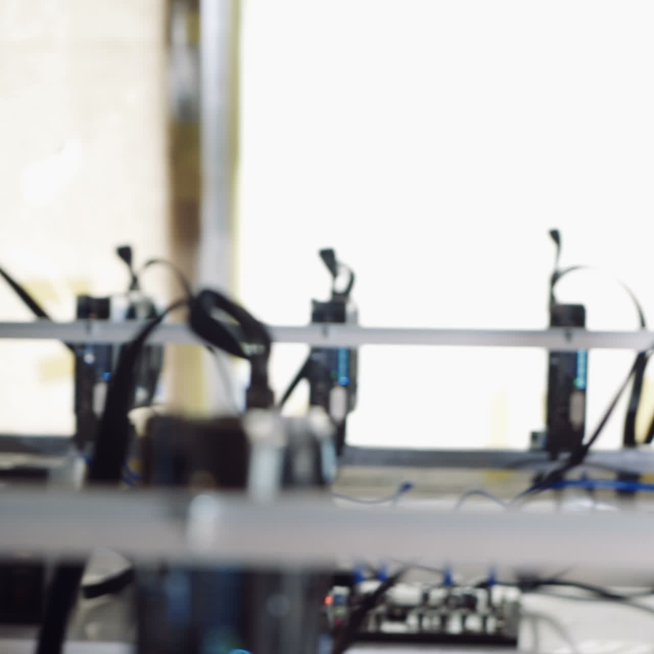 Man checks the temperature of the graphics cards on the computer. Bitcoin cryptocurrency mining farm