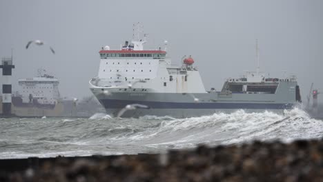 stormy seas and a cargo ship at port