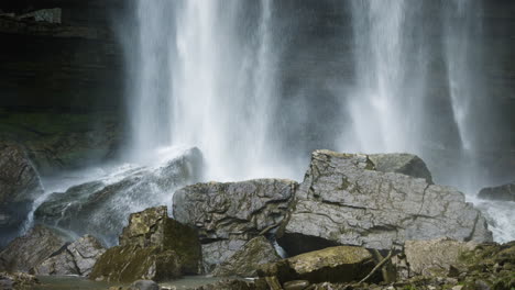 Cascading-water-falls-on-large-rectangular-blocks-of-rocks-spraying-mist