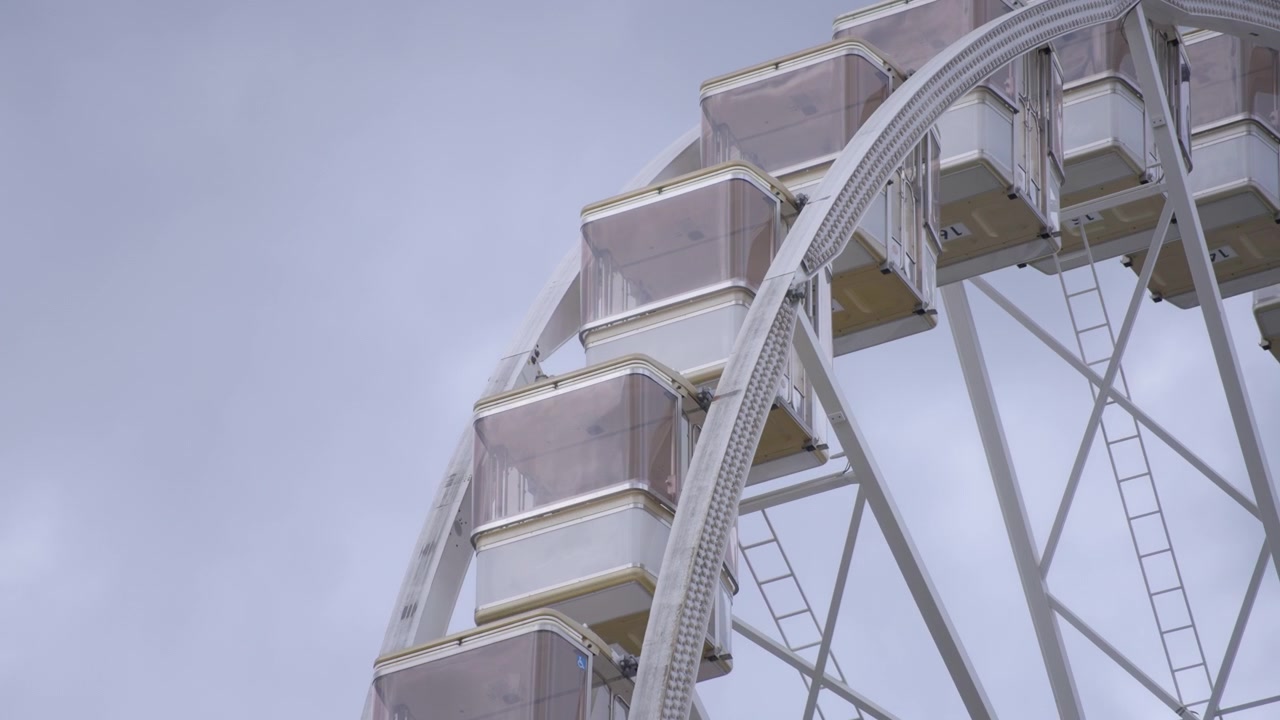 White ferris wheel rotating