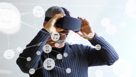 Animation of network of connections over caucasian man using vr headset