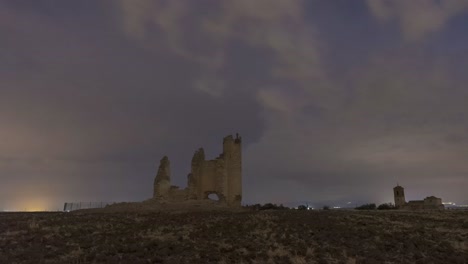 ruins of castle against stormy sky