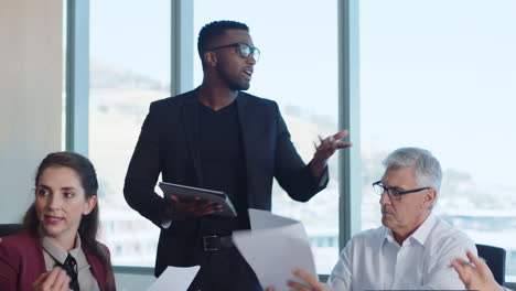 corporate business people meeting in boardroom team leader man brainstorming with colleagues discussing strategy sharing problem solving ideas collaborating in office 4k