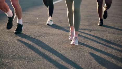 people, legs and running on road in exercise