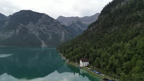 lake in tyrol austria clear still water early morning drone view