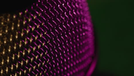 Close-up-mic-grille-top-cap-in-purple-on-turntable-display