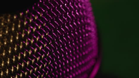 close up mic grille top cap in purple on turntable display