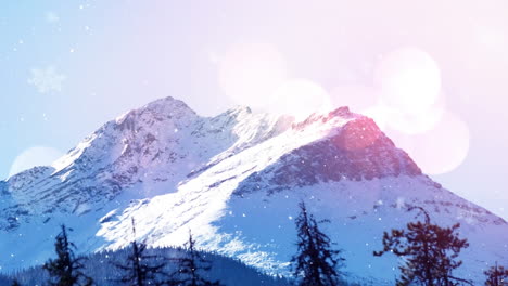animación de puntos de luz sobre la nieve que cae y el paisaje de invierno