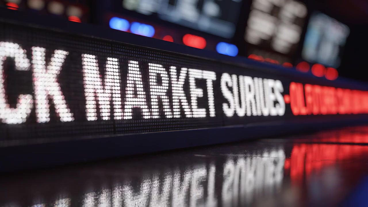 Close-up of Digital LED Stock Market Ticker Displaying Gains