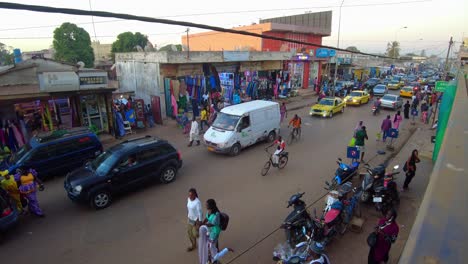 aerial static view of serekunda market famous african marketplace with bustling street of people and commerce