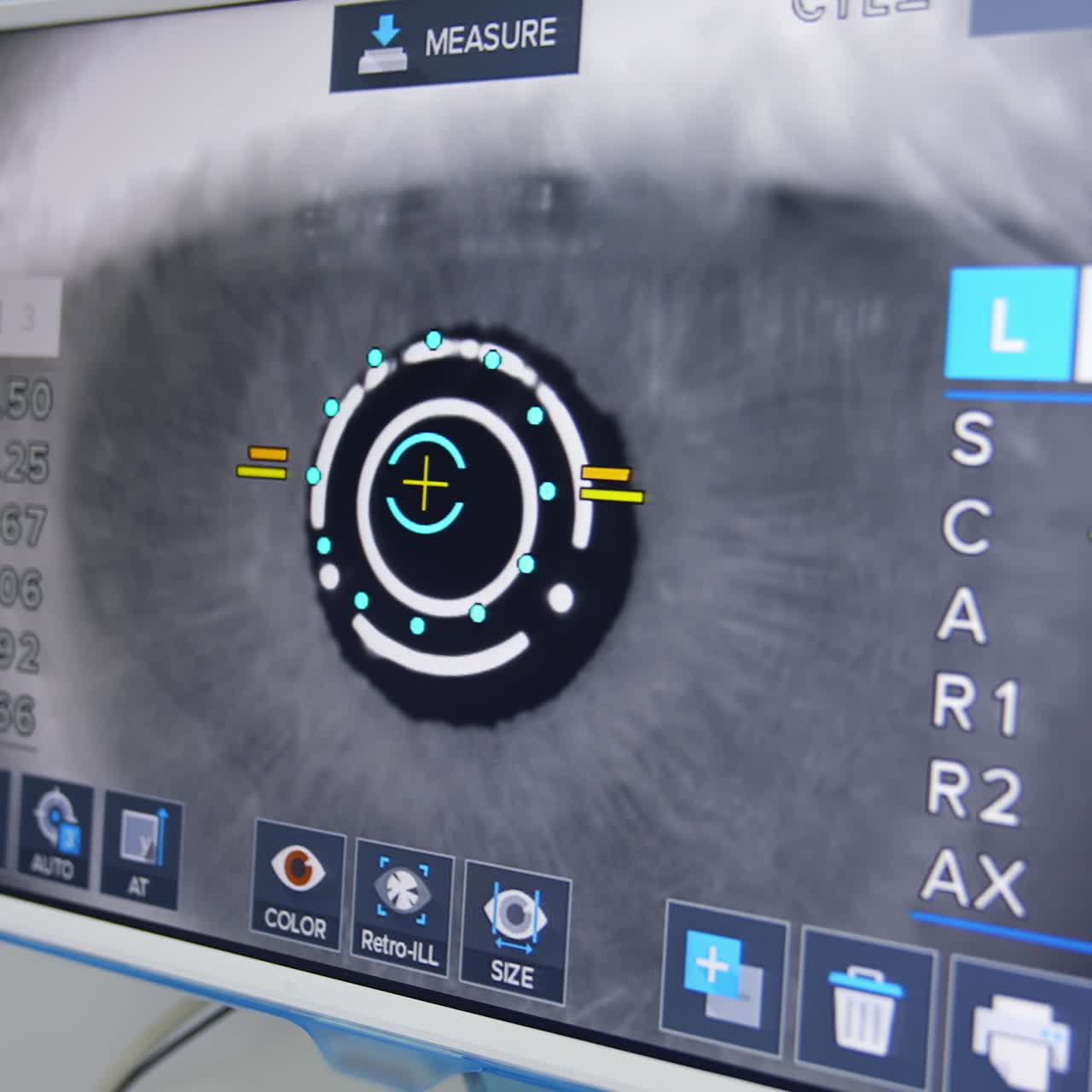 Eye examination on a monitor. Patient's eye examination on a modern computer-controlled machine. Medical equipment at the optometry clinic. Close-up