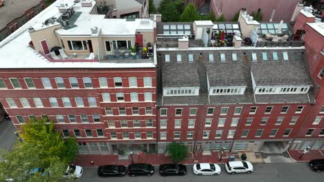 top down truck shot of tall houses and apartment buildings in urban city