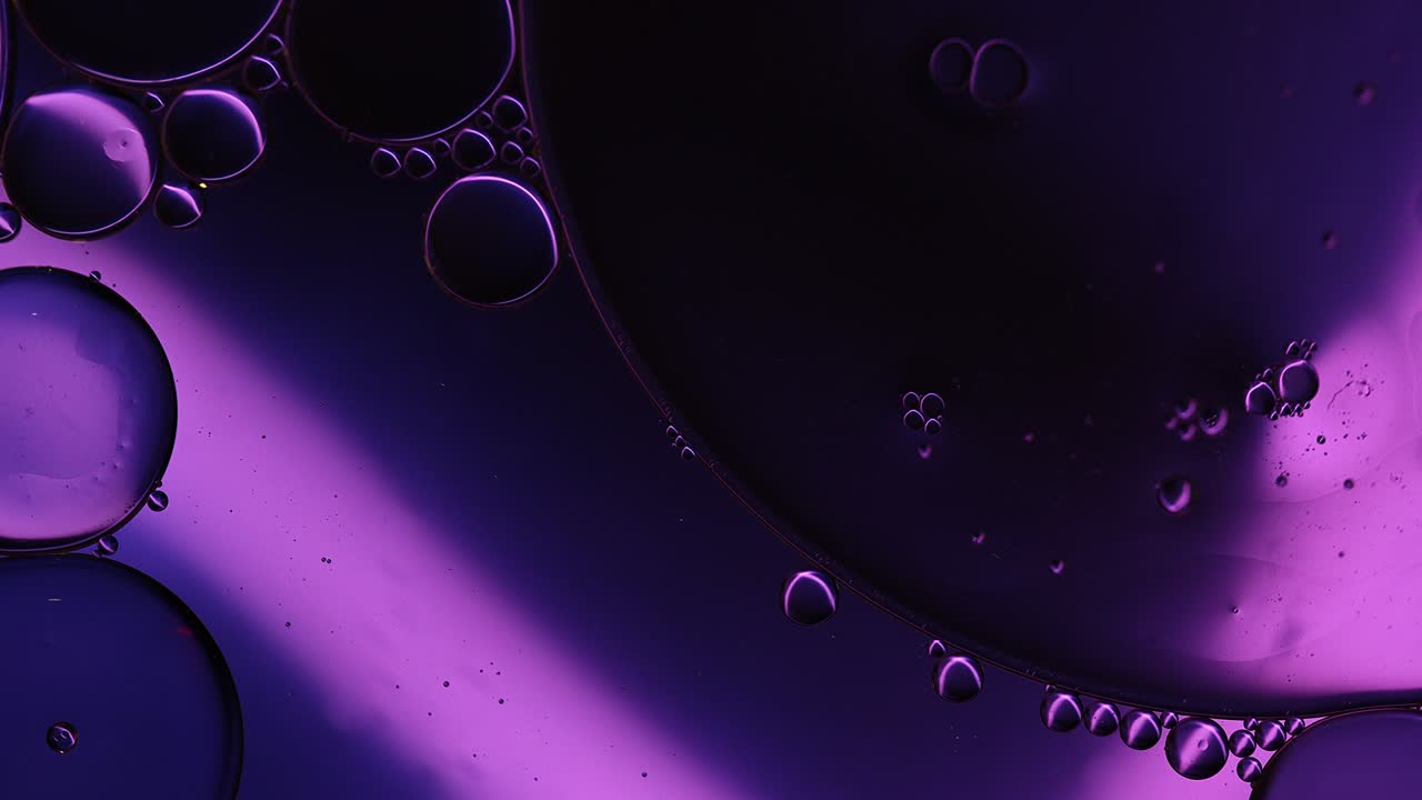 Abstract Colorful Food Oil Drops Bubbles and spheres Flowing