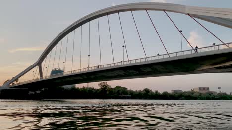 sunset over barqueta bridge in seville