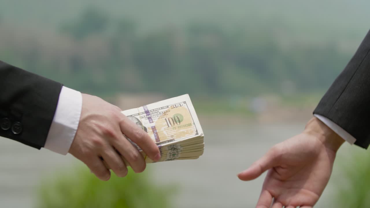 Business Deal by the River