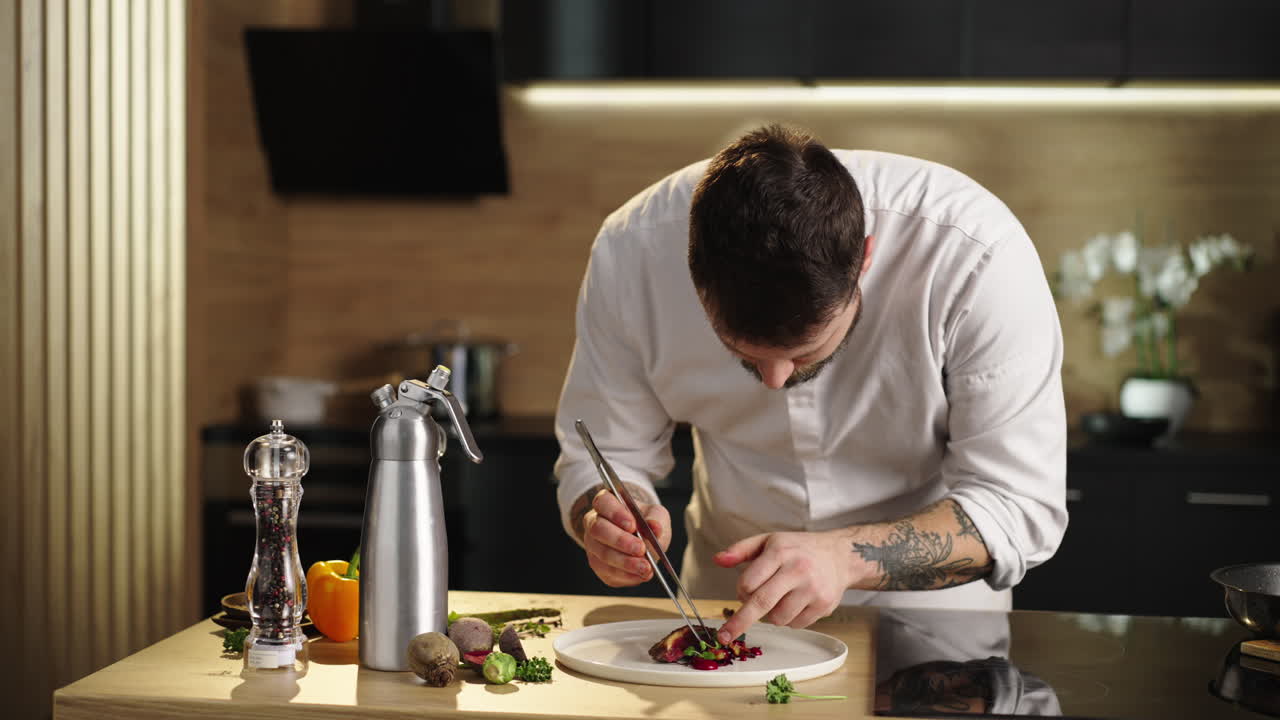 Chef plating a gourmet dish