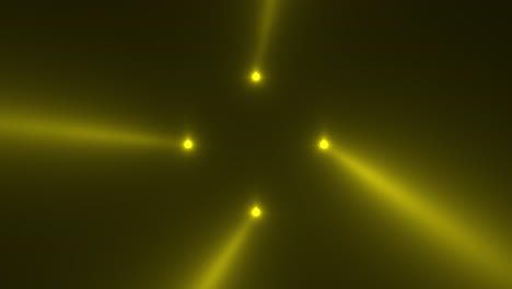 animation motion yellow glowing spotlight beams on dark background in stage