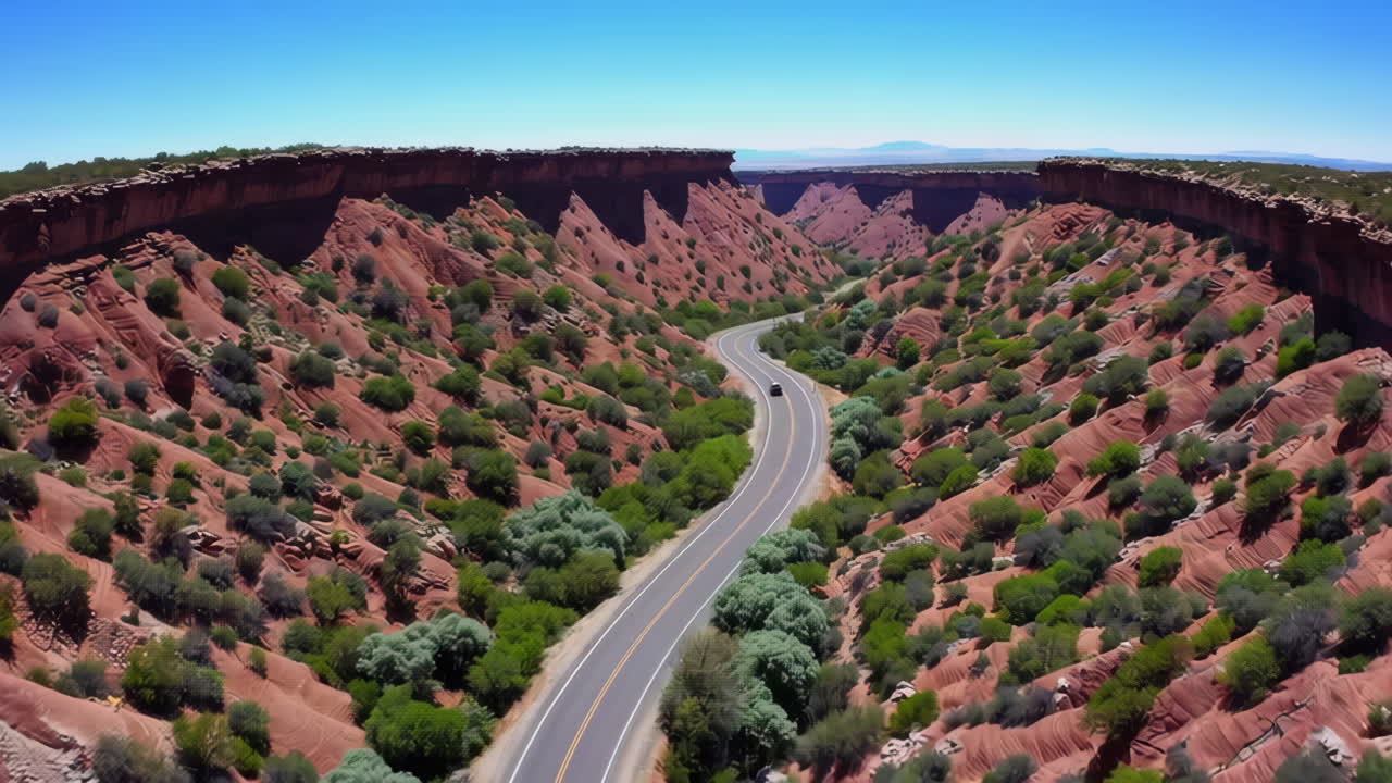 Winding Road Through a Scenic Red Rock Canyon