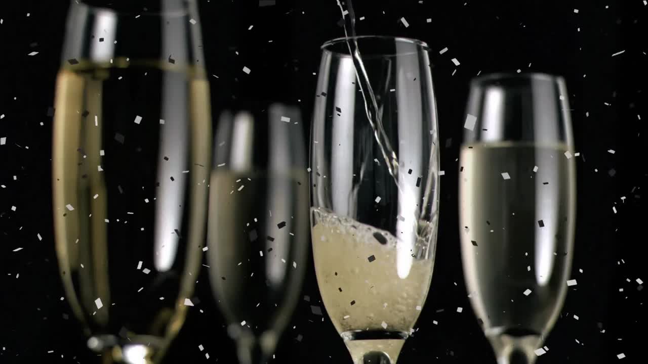 Animazione di bicchieri da champagne e champagne che viene versato, con coriandoli che cadono su sfondo nero