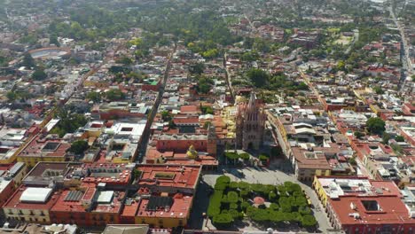 aerial view, truck left and right above san miguel de allende city center