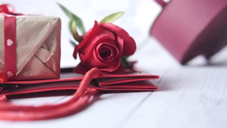 red rose and gift box