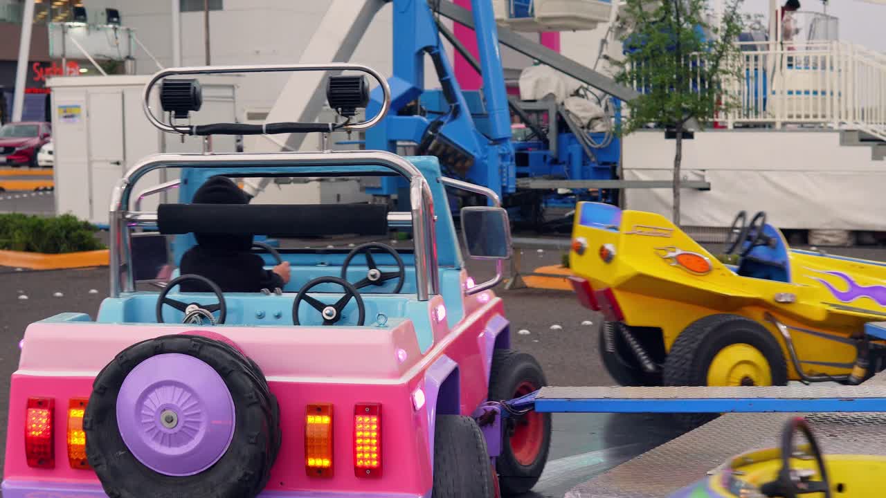 Boy having fun in mechanical games